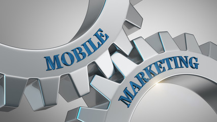 Mobile marketing concept. Words mobile marketing written on gear wheels.