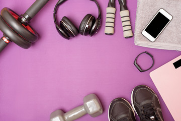 Fitness equipment on purple mat