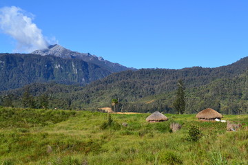 Fototapeta na wymiar mountain village in the mountains Ilaga village Papua Indonesia
