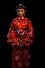 Ancient Asian brides in red on a black background