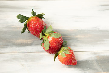 strawberries on rustic background