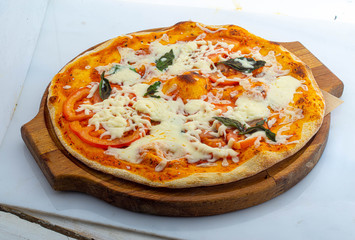 pizza with tomato and cheese