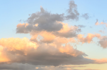 Nice sky and nice light colors looking up at sunset time, beautiful clouds above