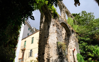 Salerno, Italy, the ancient ruins of the roman aqueduct became part of the contemporary city...