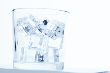 glass with ice cubes