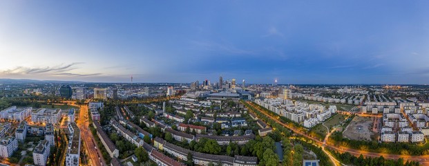 Aerial drone panorama of Frankfurt skyline during sunset from Rebstock park