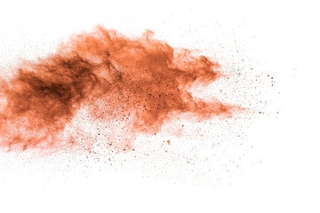 Brown powder dust cloud.Brown particles splattered on white background.