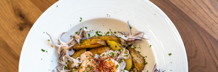 Delicious octopus dish with potatoes