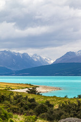 Fototapeta na wymiar Mountain range along the shores of Lake Pukaki on the South Island. New Zealand
