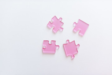 Frosted pink acrylic puzzle pieces 