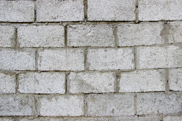 Wall made of granolith blocks