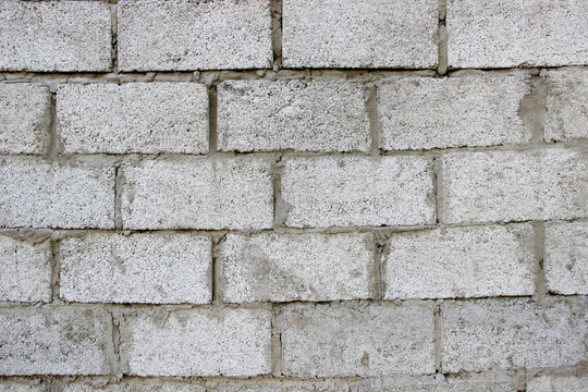 Wall made of granolith blocks