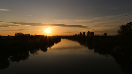 Fototapeta premium Zagreb`s Sava river in the dying hours of the day, at beautiful sunset