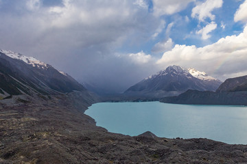 Landscapes of the Southern Alps. Snowy peaks over Lake Tasman. South Island, New Zealand