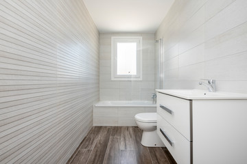Light-toned bathroom with shower