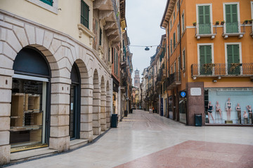 Fototapeta na wymiar Verona during Coronavirus quarantine, empty street Via Mazzini around Arena 