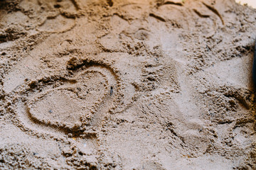 Heart painted on the sand