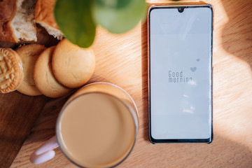 top view of Breakfast with coffee, croissant and cookies