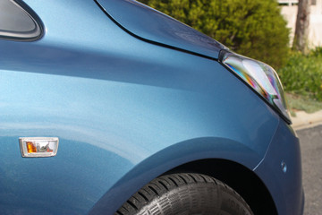 Fototapeta premium Close up of metallic blue vehicle fender