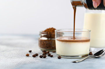 Dalgona frothy coffee trend korean drink latte espresso with coffee foam in glass cups
