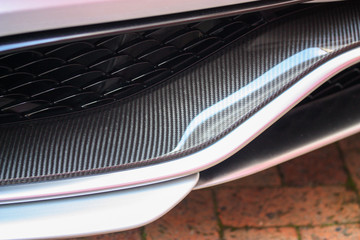 Close up of carbon fiber trim on a car