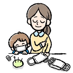 感染症予防のため、手作りマスクを制作するお母さん。子供や家族のために。