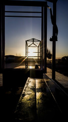 sunset in the city, empty bus stop place, coronavirus