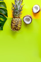 tropical fruits for summer design on yellow background top view mock-up