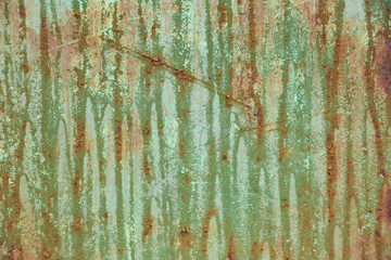 background of smudges on old green  paint on rusty metal