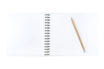 An open notebook with white pages and a wooden pencil lying on the right, isolated on a white background with a clipping path.
