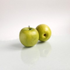 green apples on a white background