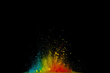Colored powder explosion. Abstract closeup dust on backdrop. Colorful explode. Paint holi..d....