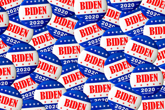 Biden presidential election campaign buttons spread all over table with 2020 and make america great again text. Voting and election rally in the us concept.