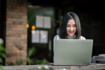 Working at home / Asians are sitting and working after the Coronavirus outbreak.