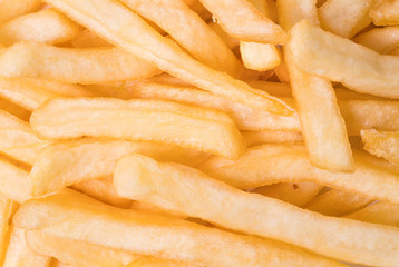 french fries on a white plate close up