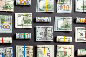 colored Background with money american hundred dollar bills on top wiev with copy space for your...