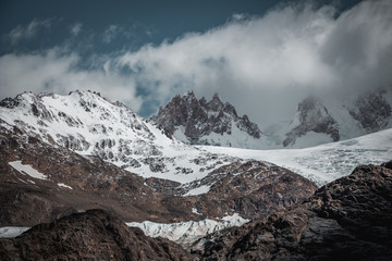 Obraz premium mountain landscape with snow glacier and clouds