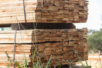 wood boards stacked for drying process in the sawmill