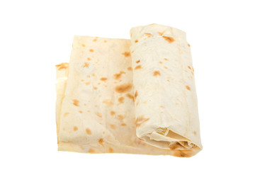 Thin pita bread on a white background, isolated.