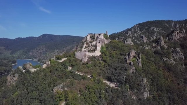 Flight around of ruined Durnstein castle, Wachau valley, Austria