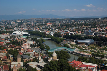 Fototapeta na wymiar Traditional Georgian architecture and panoramic view of Tbilisi city, old town and modern architecture. Tbilisi the capital of Georgia