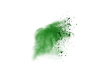 green powder explosion isolated on white background.