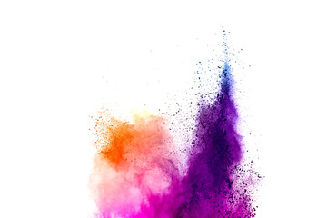 Freeze motion of colored powder explosions isolated on white background.