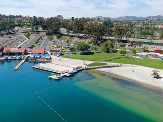 Fototapeta na wymiar Aerial view of Lake Mission Viejo, with recreational facilities and beach Playa Del Norte. Orange County, California, USA