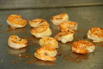 Shrimp, cooking in a professional kitchen.