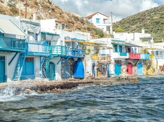 Klima Fishing Village with bright coloured wooden doors - Milos Island - Greece