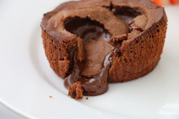 Chocolate dessert filled with hot chocolate cream