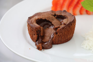 Chocolate dessert filled with hot chocolate cream