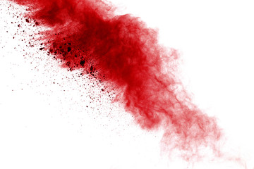 Red powder explosion on white background. Colored cloud. Colorful dust explode. Paint Holi.