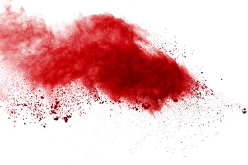 Red powder explosion on white background. Colored cloud. Colorful dust explode. Paint Holi.